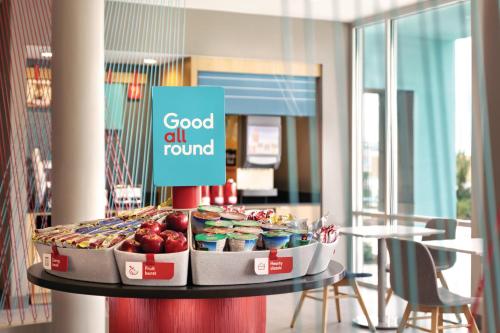 a display of food on a table in a restaurant at avid hotel Austin - Round Rock South by IHG in Round Rock