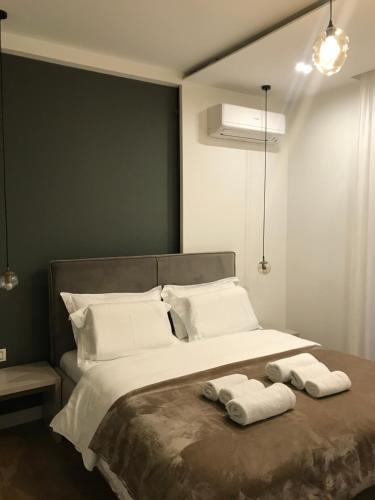 Ένα ή περισσότερα κρεβάτια σε δωμάτιο στο Guesthouse Sara & Esi
