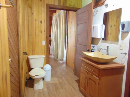 Ένα μπάνιο στο Cabaña dentro del Bosque para 24 Personas