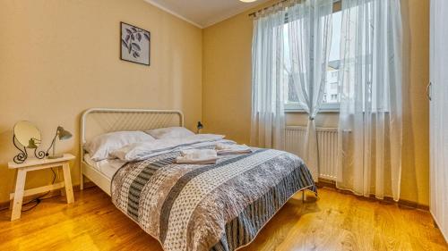 Кровать или кровати в номере Apartament Górski - 5D Apartamenty