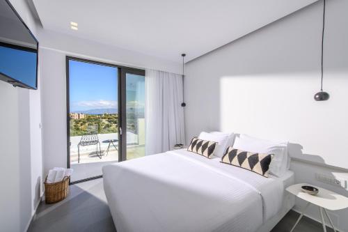 Ein Bett oder Betten in einem Zimmer der Unterkunft Cocoon Luxury Villas