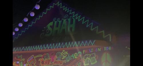 a close up of a sign with neon lights at SHAH SOCIAL PARTY VILLA In Royal Palms Mumbai in Mumbai