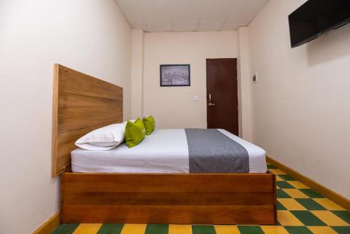 Postel nebo postele na pokoji v ubytování Hotel Ayenda Skall 1319
