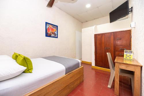 Postel nebo postele na pokoji v ubytování Hotel Ayenda Skall 1319
