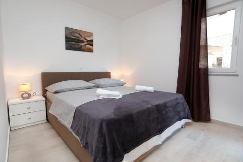 Postel nebo postele na pokoji v ubytování Villa Stella