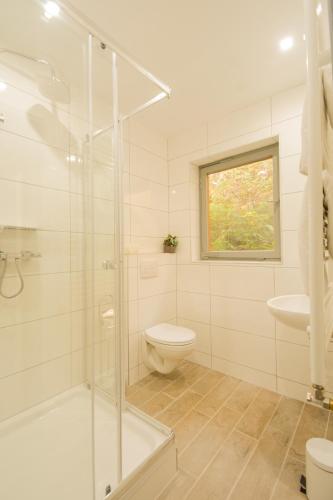 Ένα μπάνιο στο Mainzimmer - Business Apartments