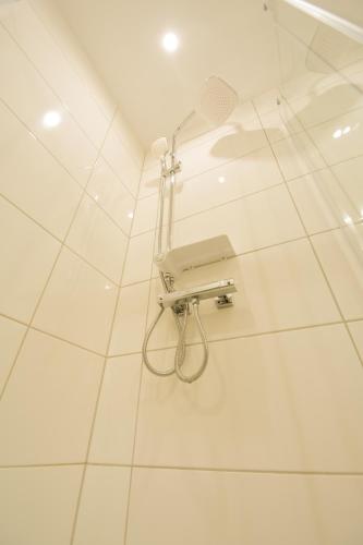 Ένα μπάνιο στο Mainzimmer - Business Apartments