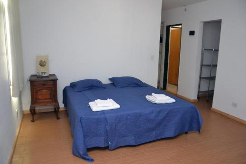 Ein Bett oder Betten in einem Zimmer der Unterkunft B&B Garden Atelier