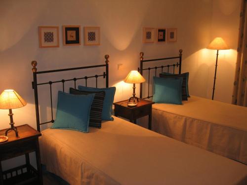 Llit o llits en una habitació de Casa Fatana