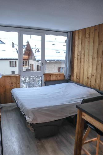 Llit o llits en una habitació de Résidence Mummery Chamonix