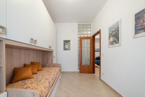 A bed or beds in a room at Appartamenti Parco Archeologico