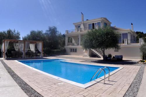 The swimming pool at or near Villa Crystal Corfu