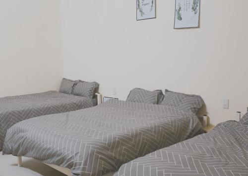 Postel nebo postele na pokoji v ubytování Rot Homestay
