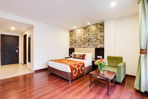 En eller flere senger på et rom på The Fern Denzong Hotel & Spa Gangtok, Sikkim