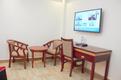 TV a/nebo společenská místnost v ubytování Vickmark Hotel