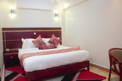 Postel nebo postele na pokoji v ubytování Vickmark Hotel