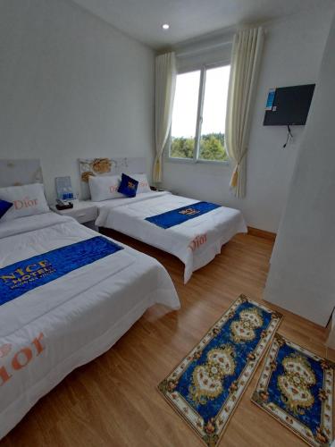 Cama o camas de una habitación en Nice Hotel Buôn Ma Thuột