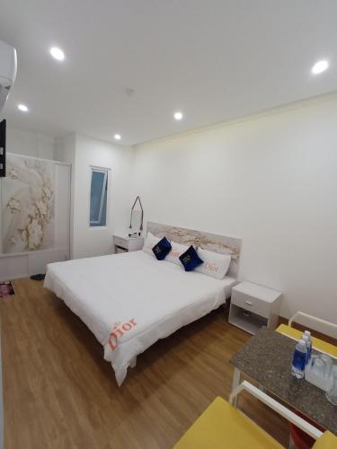 Cama o camas de una habitación en Nice Hotel Buôn Ma Thuột