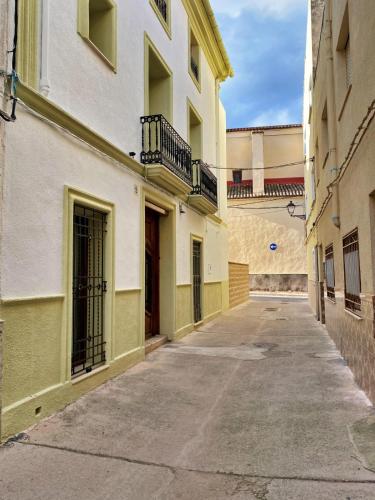 an empty alleyway between two buildings at PALACIO Boutique in Anna