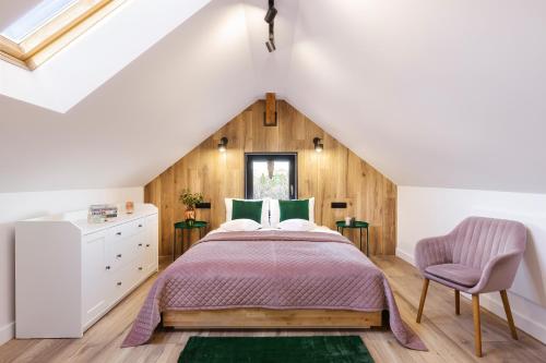 Posteľ alebo postele v izbe v ubytovaní Apartamenty AstoriA