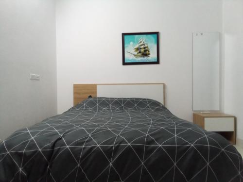 Ein Bett oder Betten in einem Zimmer der Unterkunft NTD apartment