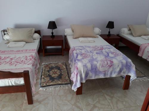 Postel nebo postele na pokoji v ubytování Yria Residencial