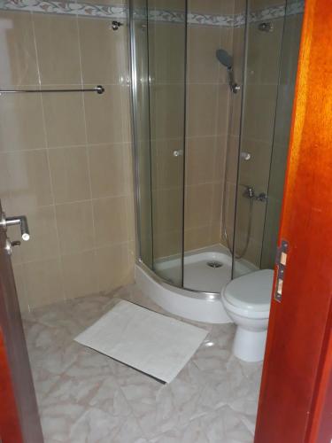 Koupelna v ubytování Yria Residencial