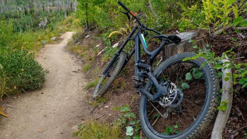 a bike is parked on a dirt trail at La Quinta Inn by Wyndham Steamboat Springs in Steamboat Springs