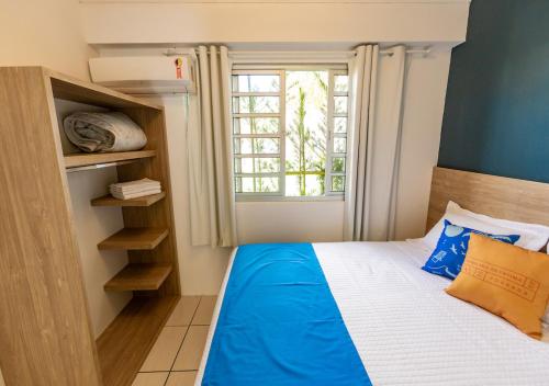 Кровать или кровати в номере Pousada Nossa Senhora de Fatima