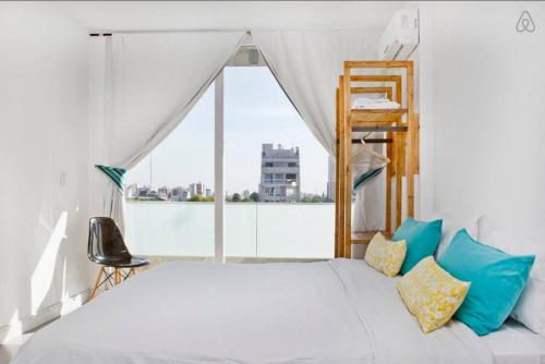 Voodi või voodid majutusasutuse Vizion Hollywood Apartments toas