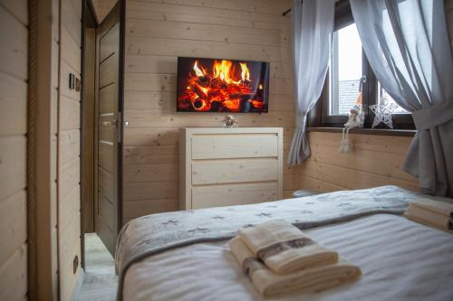 Postel nebo postele na pokoji v ubytování Zrúboček / Log Cabin