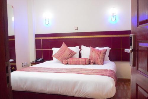 Postel nebo postele na pokoji v ubytování Vickmark Hotel