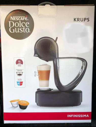 a coffee maker on display in a box at CAVALAIRE vue MER au loin MAISONNETTE TOUT ÉQUIPÉE POUR 4 PERSONNES AVEC PISCINE CLIM WIFI VÉLOS TV BARBECUES in Cavalaire-sur-Mer
