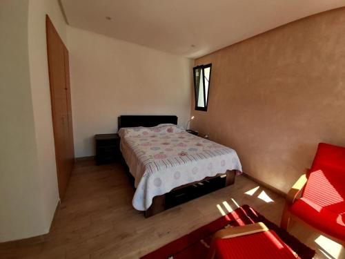 Tempat tidur dalam kamar di Vus sur mer et piscine