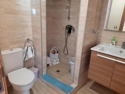 Ванная комната в Vus sur mer et piscine