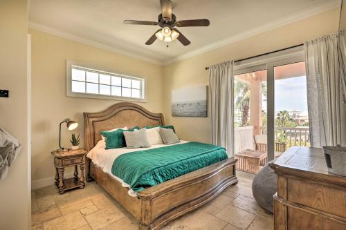 a bedroom with a bed and a ceiling fan at Palm Coast Oasis with Pool Steps to Cinnamon Beach! in Palm Coast