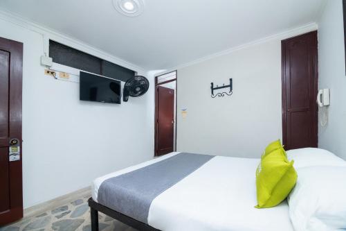 TV a/nebo společenská místnost v ubytování Hotel Ayenda Calypso 1142