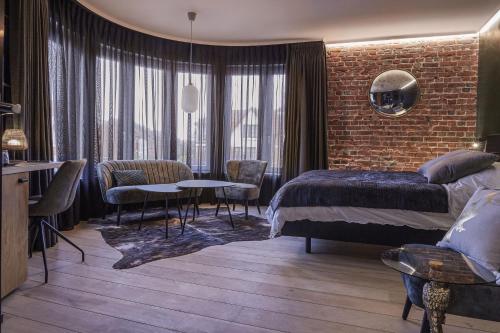 Photo de la galerie de l'établissement ONIRO - Luxury Rooms & Wellness Suites, à Tournai