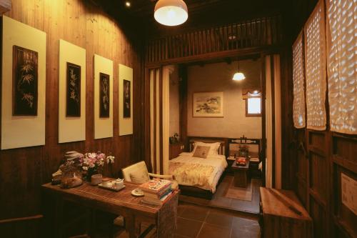 WuYuan QiYe YanXiang Guesthouseにあるシーティングエリア