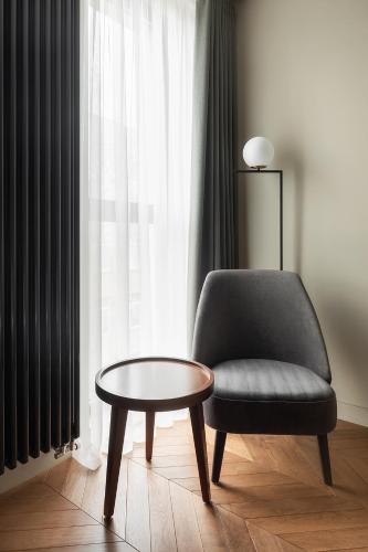 Ein Sitzbereich in der Unterkunft Potocki Boutique Hotel