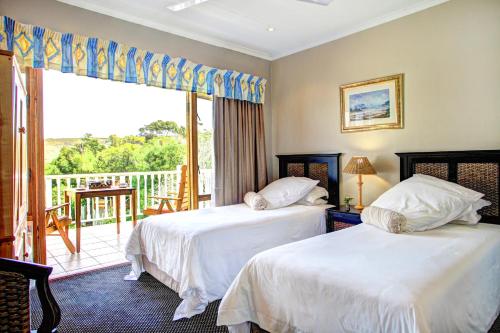 Katil atau katil-katil dalam bilik di Waterfront Lodge