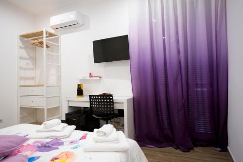 Ένα ή περισσότερα κρεβάτια σε δωμάτιο στο B&B LA CHICCA