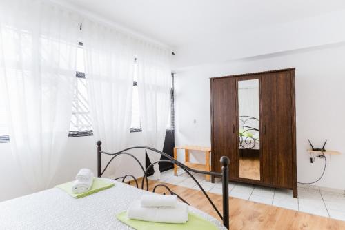 Posteľ alebo postele v izbe v ubytovaní Driopon Apartment - Penthouse