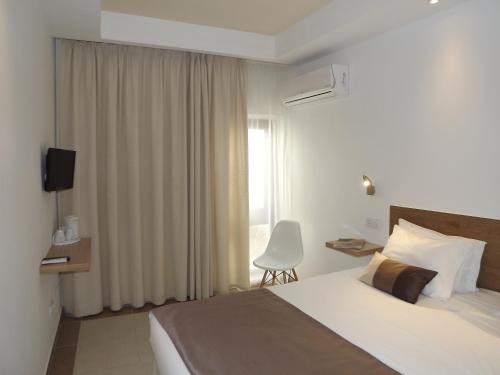 Cama o camas de una habitación en Hotel Mar Azul