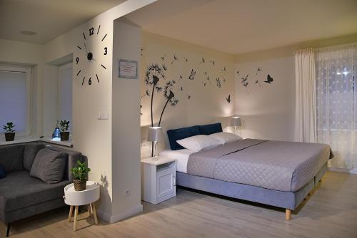 Łóżko lub łóżka w pokoju w obiekcie Apartamenty Sjesta River