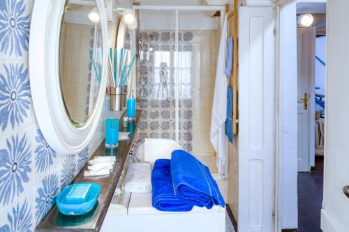 a bathroom with a sink and a mirror at IVANA Apartment in Levanto