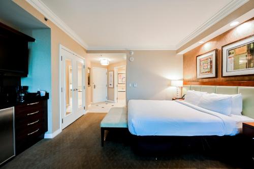 Two-Bedroom Conjoined Studio Suite W/Balcony & Strip View at Signature