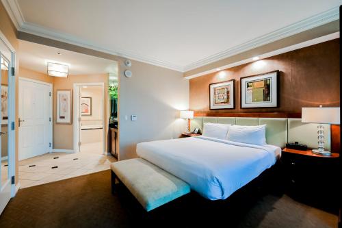 Two-Bedroom Conjoined Studio Suite W/Balcony & Strip View at Signature