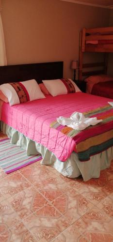 Cama o camas de una habitación en Hostal Illari