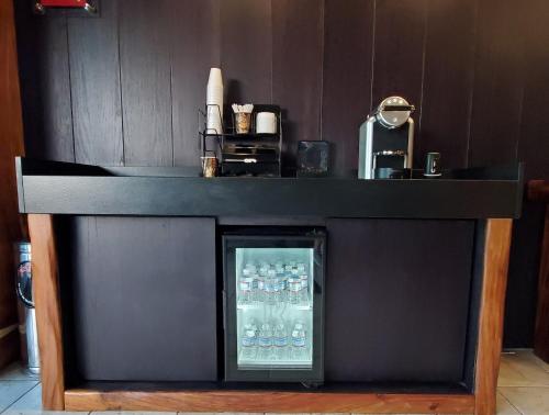 a counter with a drink cooler in a room at HOTEL RIO RITA in Tijuana